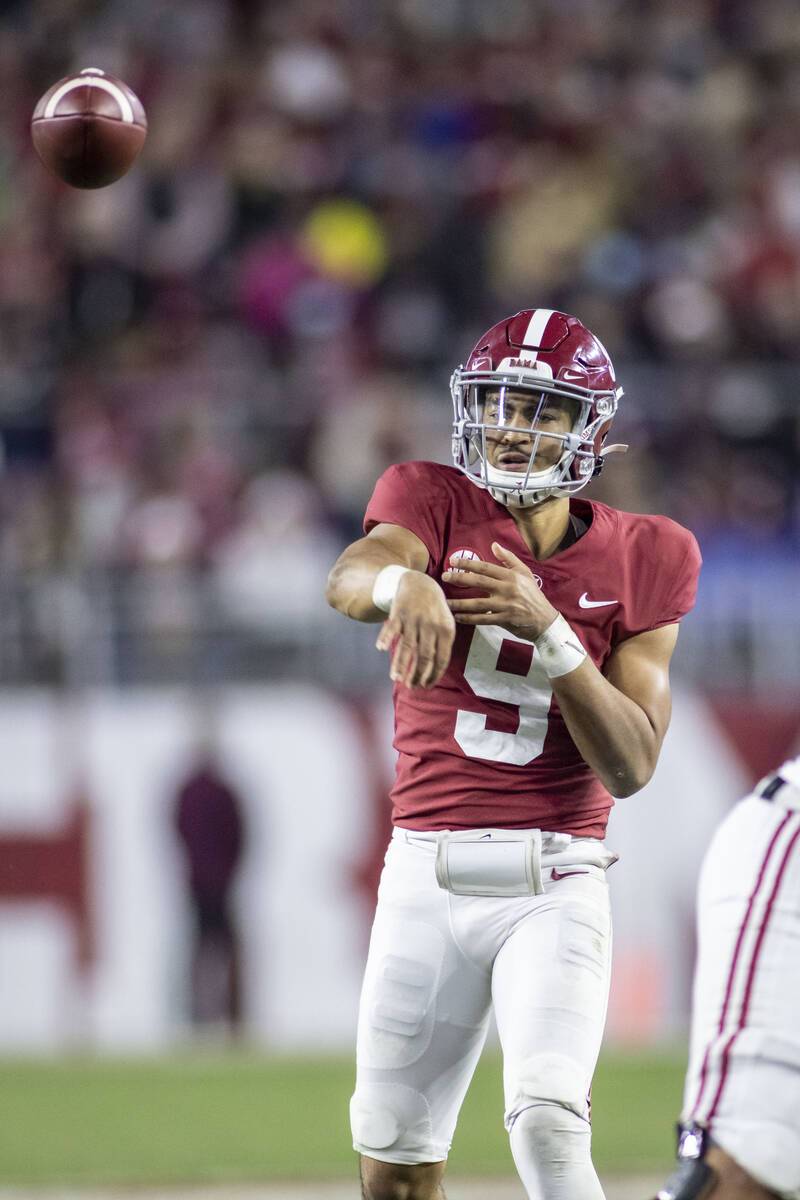 Alabama quarterback Bryce Young throws a pass against Arkansas during the second half of an NCA ...