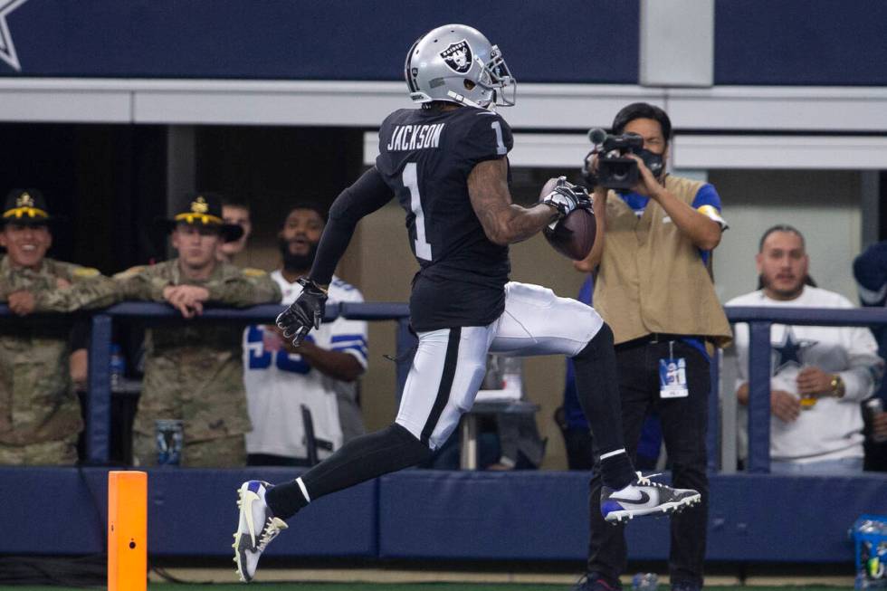 Raiders wide receiver DeSean Jackson (1) runs in for a touchdown during the first quarter of an ...