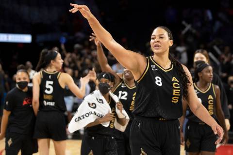 Las Vegas Aces center Liz Cambage (8) waves goodbye to Washington Mystic players after the Ace ...