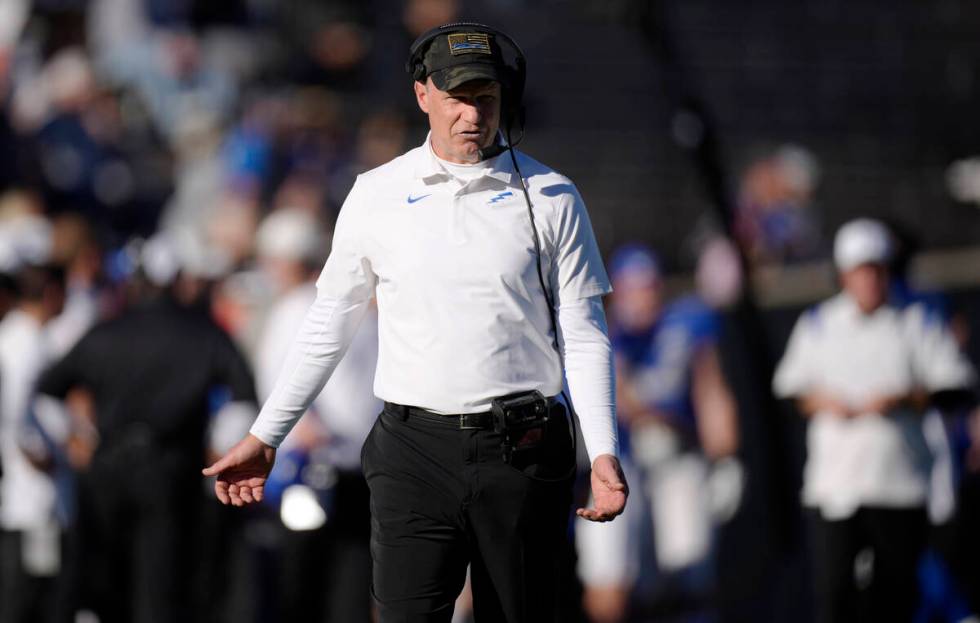 Air Force head coach Troy Calhoun aergues with referees for a call in the first half of an NCAA ...