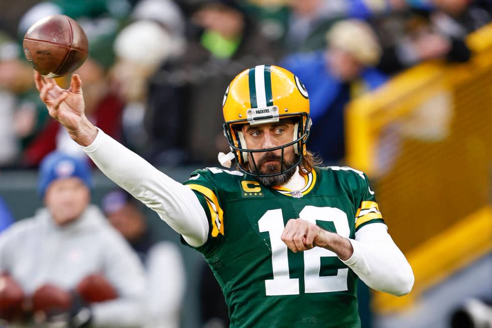 Green Bay Packers quarterback Aaron Rodgers (12) warms up prior to an NFL football game against ...