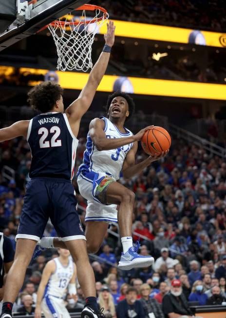 Duke Blue Devils guard Jeremy Roach (3) looks to shoot past Gonzaga Bulldogs forward Anton Wats ...