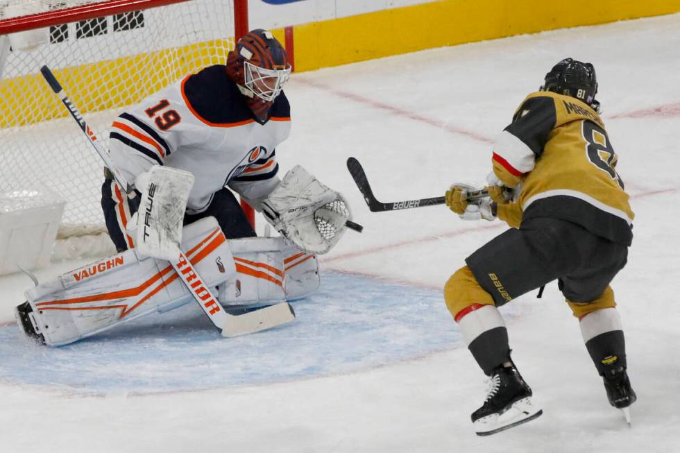 Golden Knights center Jonathan Marchessault (81) shoots against Edmonton Oilers goaltender Mikk ...