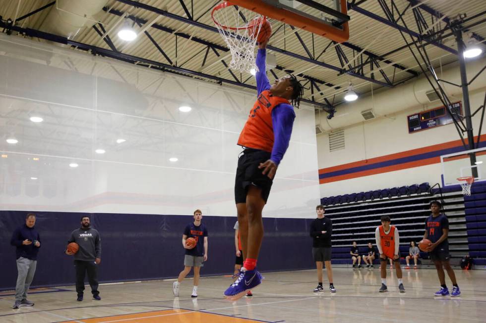 Darrion Williams goes to the basket during a basketball practice at Bishop Gorman High School, ...