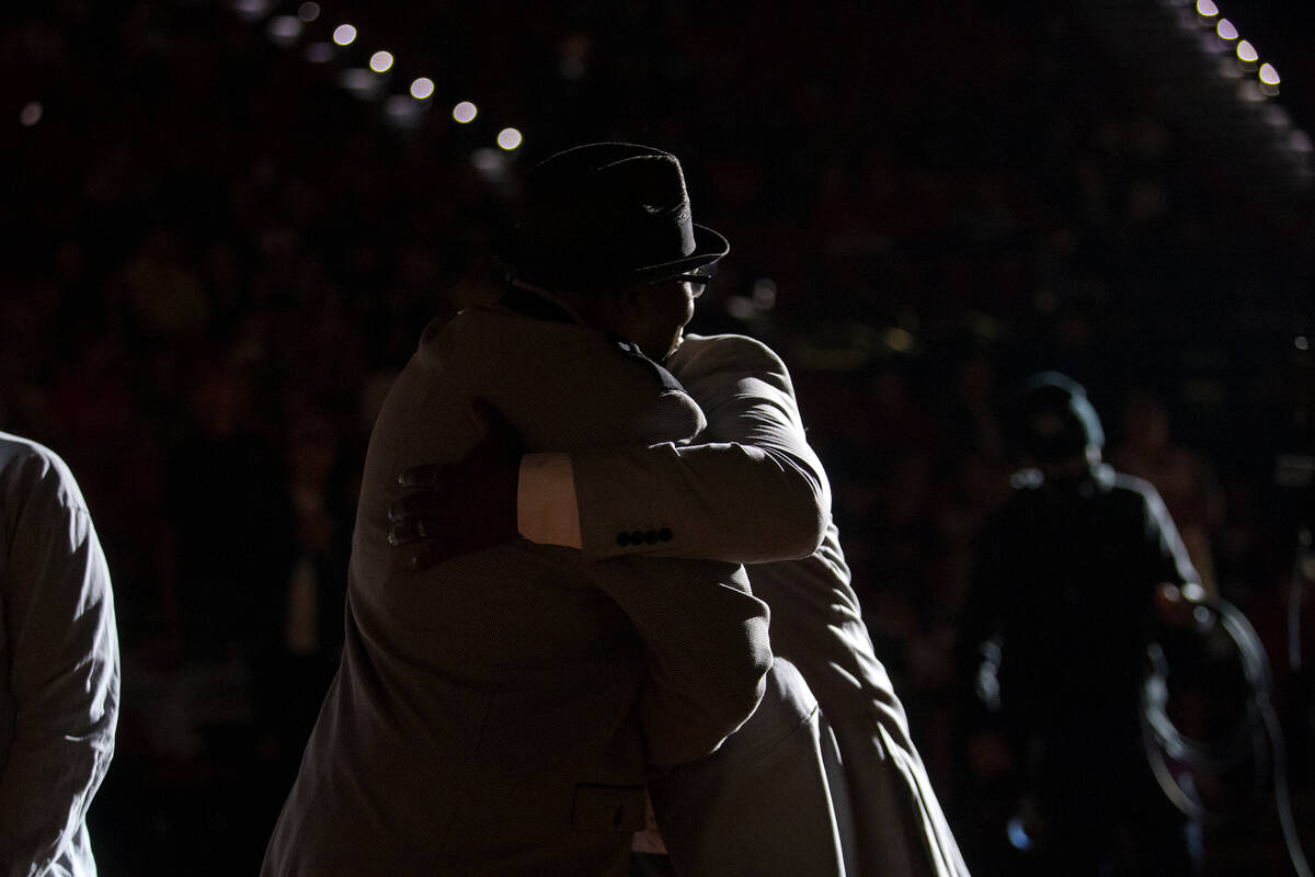 Freddie Banks, a former UNLV and professional basketball player, hugs UNLV athletic director Er ...