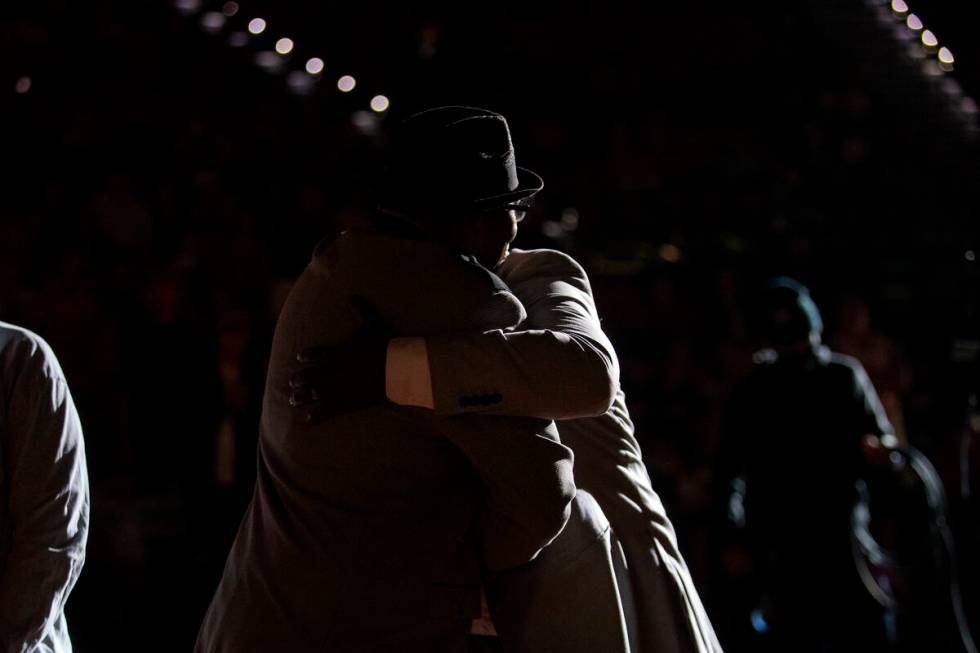 Freddie Banks, a former UNLV and professional basketball player, hugs UNLV athletic director Er ...