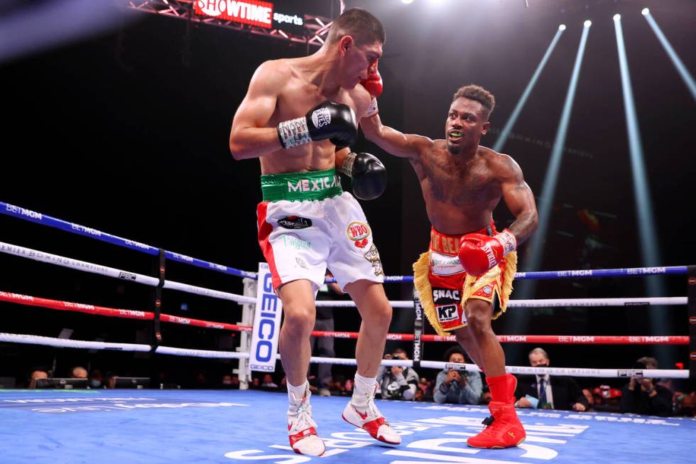 Raeese Aleem, right, battles Eduardo Baez in the seventh round of a featherweight fight at the ...