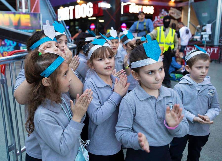 Desert Torah Academy Children's Choir waits to perform during a celebration of the first night ...