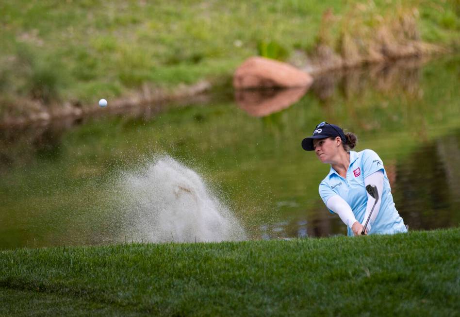 Ally Ewing hits out of the bunker at the 17th hole during the championship round of the Bank of ...