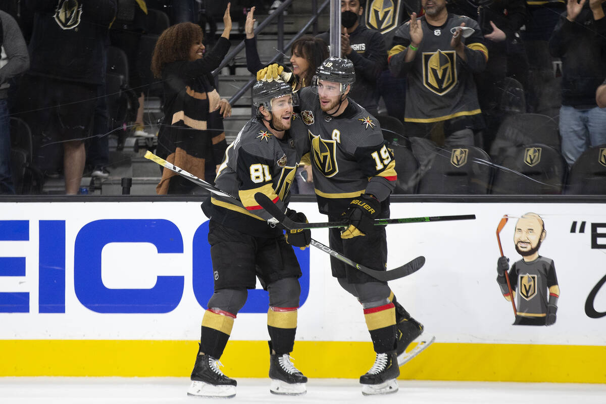 Golden Knights center Jonathan Marchessault (81) and right wing Reilly Smith (19) celebrate a g ...
