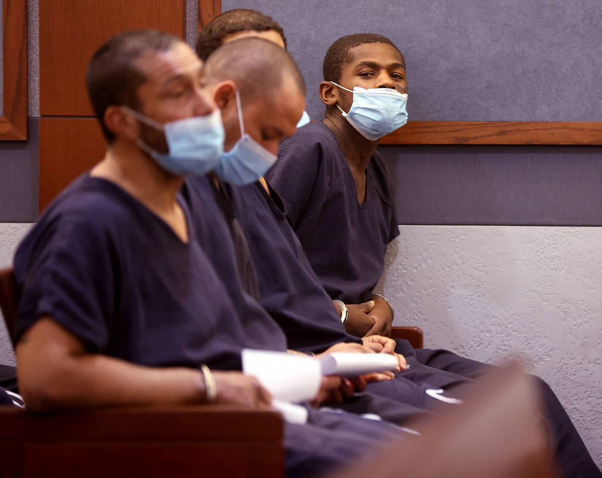 James Vaughn, 26, right, waits to appear in court at the Regional Justice Center in Las Vegas T ...
