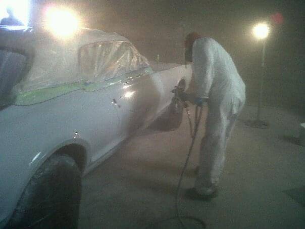 James Katsilometes is shown applying new paint on the 1967 Mercury Cougar owned by Review-Journ ...