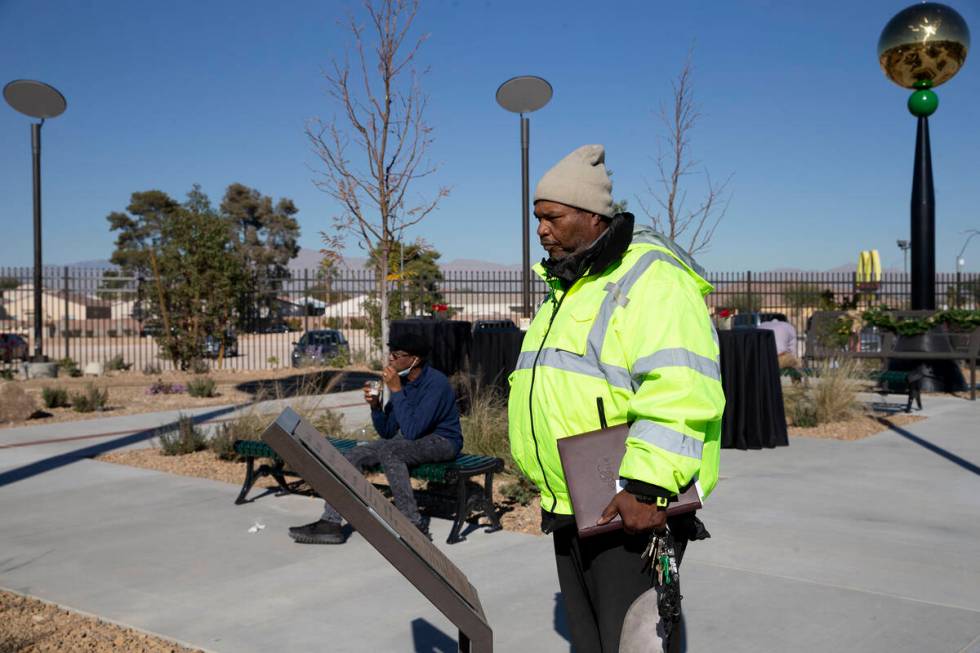 Johnny Bell, who said he has lived in Las VegasՠWestside most of his life, reads a histor ...