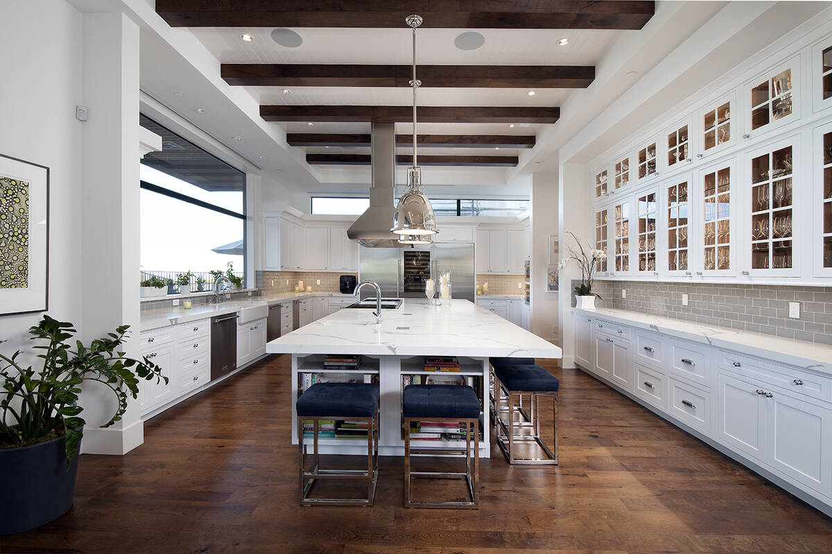 Expansive central or dual islands create a strong focal point for high-end kitchens, as well as ...