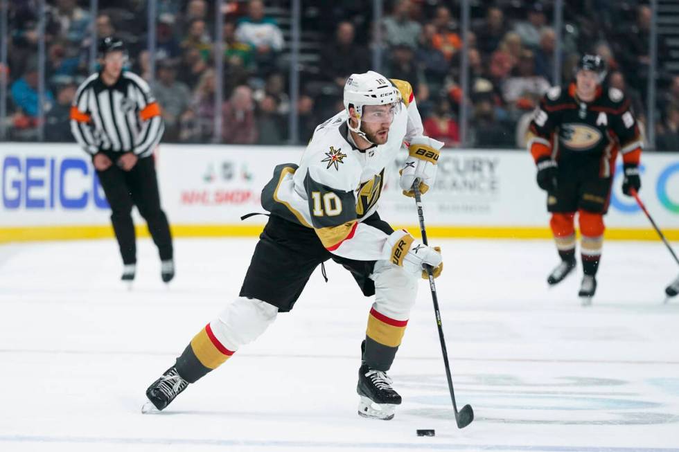 Vegas Golden Knights' Nicolas Roy moves the puck during the first period of an NHL hockey game ...