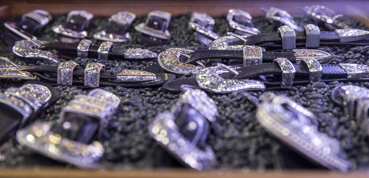 Custom items on display from Vogt Buckles Silversmiths during the opening night of the Cowboy C ...