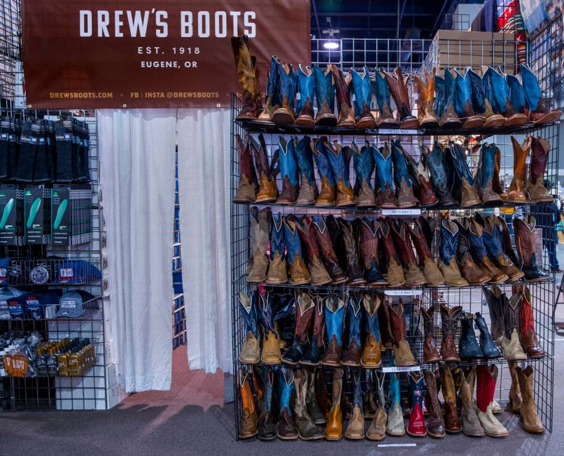 A selection of DrewÕs Boots on display for sale during the opening night of the Cowboy Cha ...