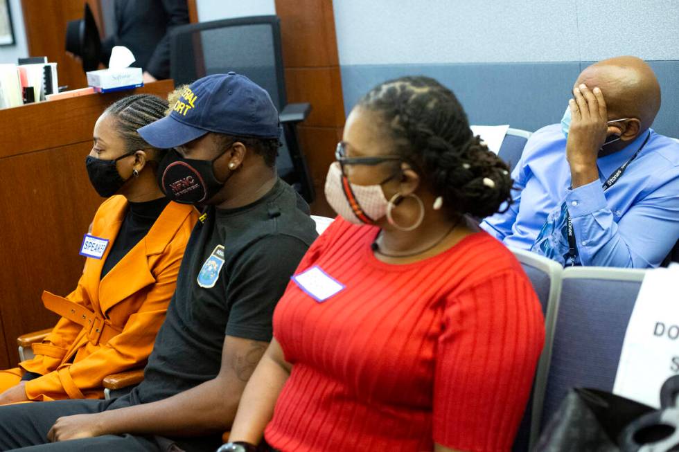 Rayven Thomas, left, her twin brother Rayvon Thomas, and her mother Regina Shorter attend the s ...