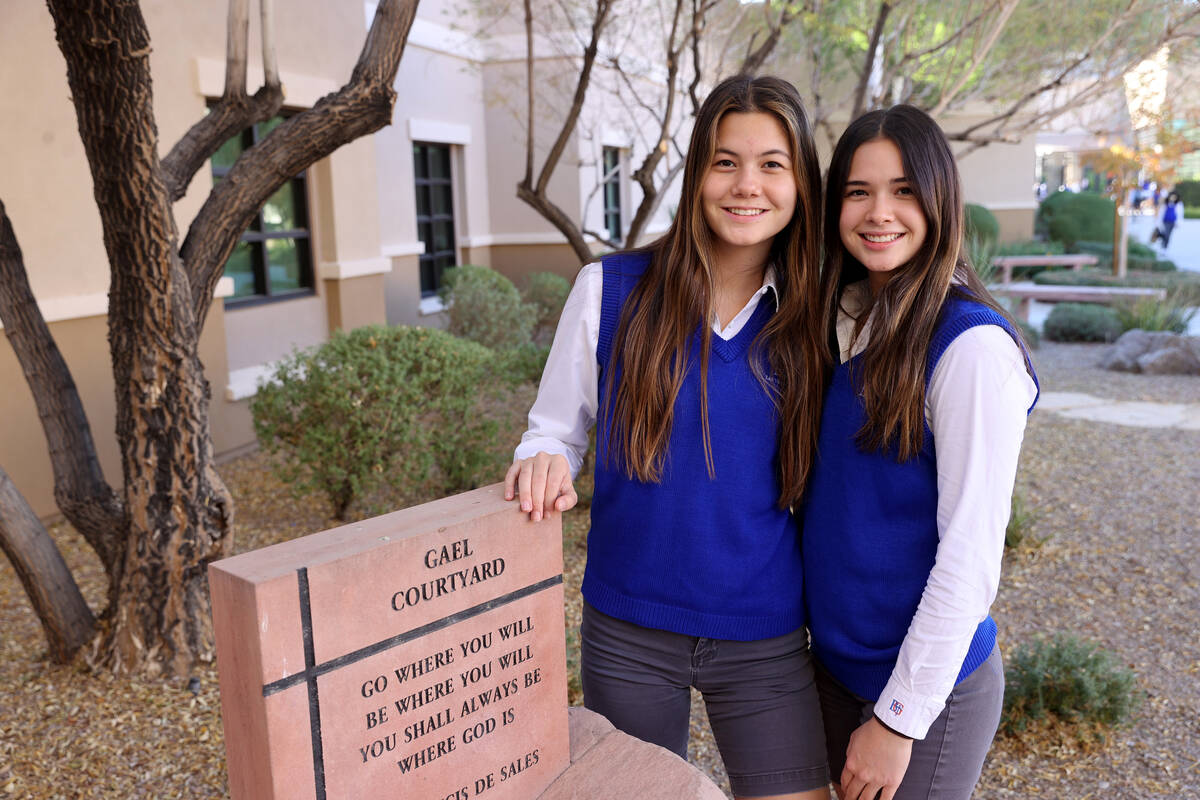 Bishop Gorman students Lauren Edgeworth, a junior, left, and her sister Caroline, a senior, at ...