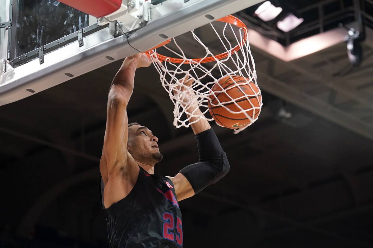 SMU forward Tristan Clark dunks in the second half of an NCAA college basketball game against U ...