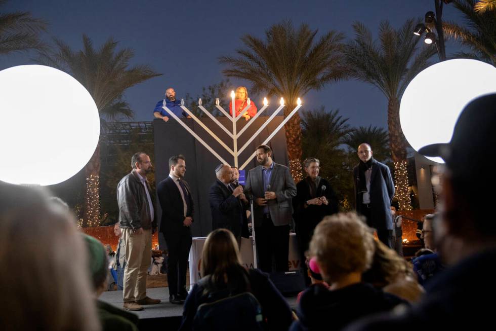Local rabbis gather on state to light the menorah for the fourth night of Hanukkah celebration ...