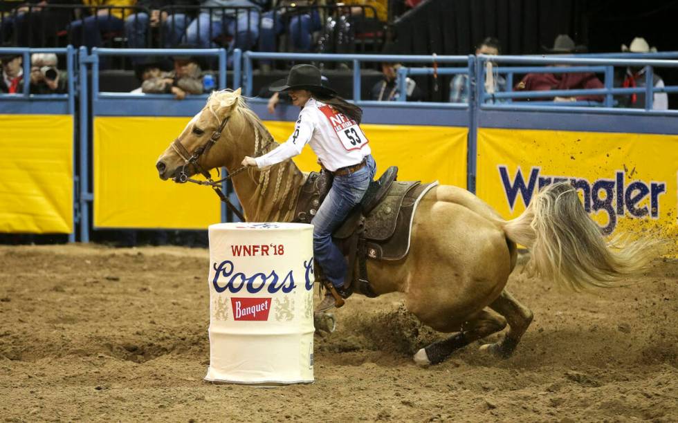 Hailey Kinsel of Cotulla, Texas (53) competes in the barrel racing event during the ninth go-ro ...