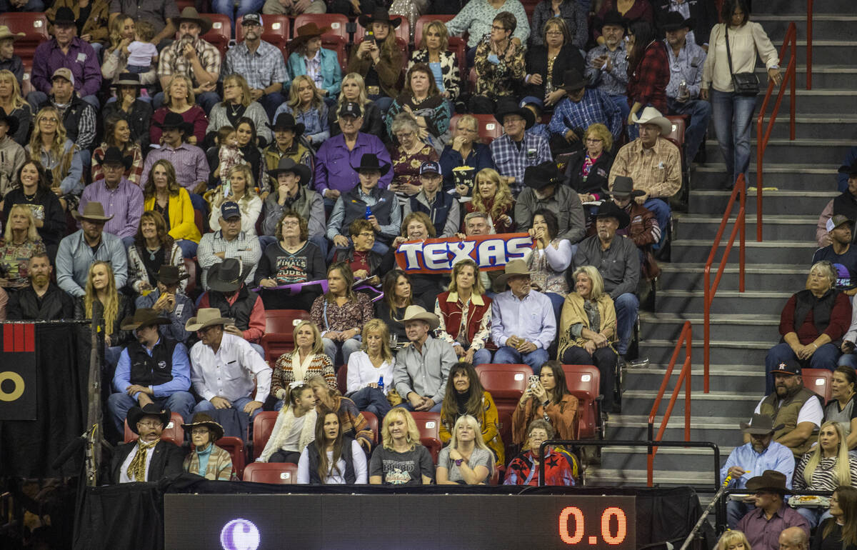 Fans enjoy the competition during the opening night of Wrangler National Finals Rodeo at the Th ...