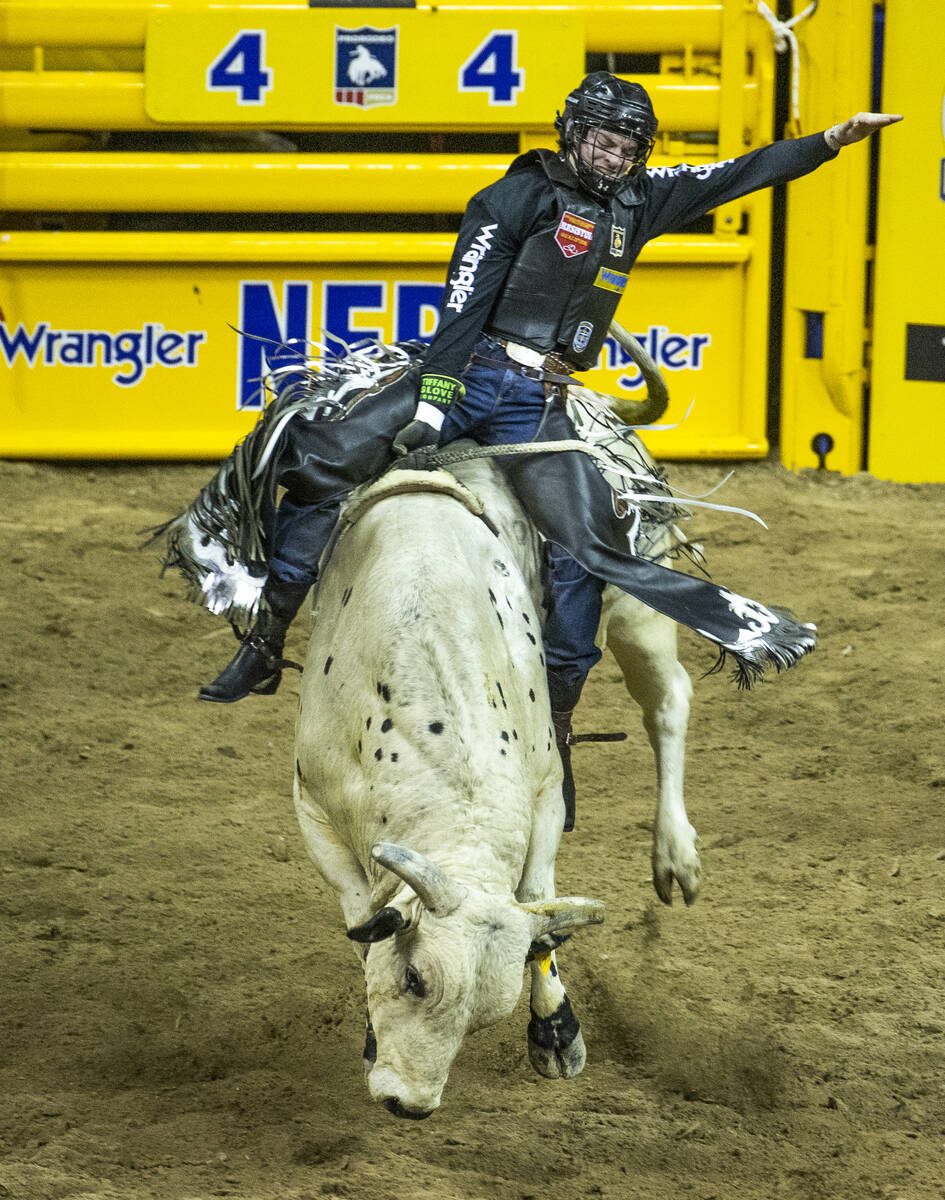 Ky Hamilton of Mackay, AU, rides Rip in Bull Riding to tie for first place during the opening n ...