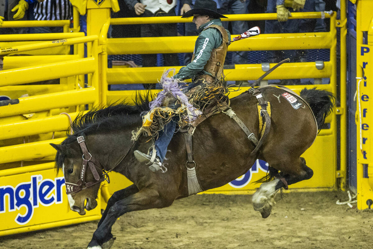 Tegan Smith of Winterset, IA., rides YesterdayÕs Delivery to first place in Saddle Bronc R ...