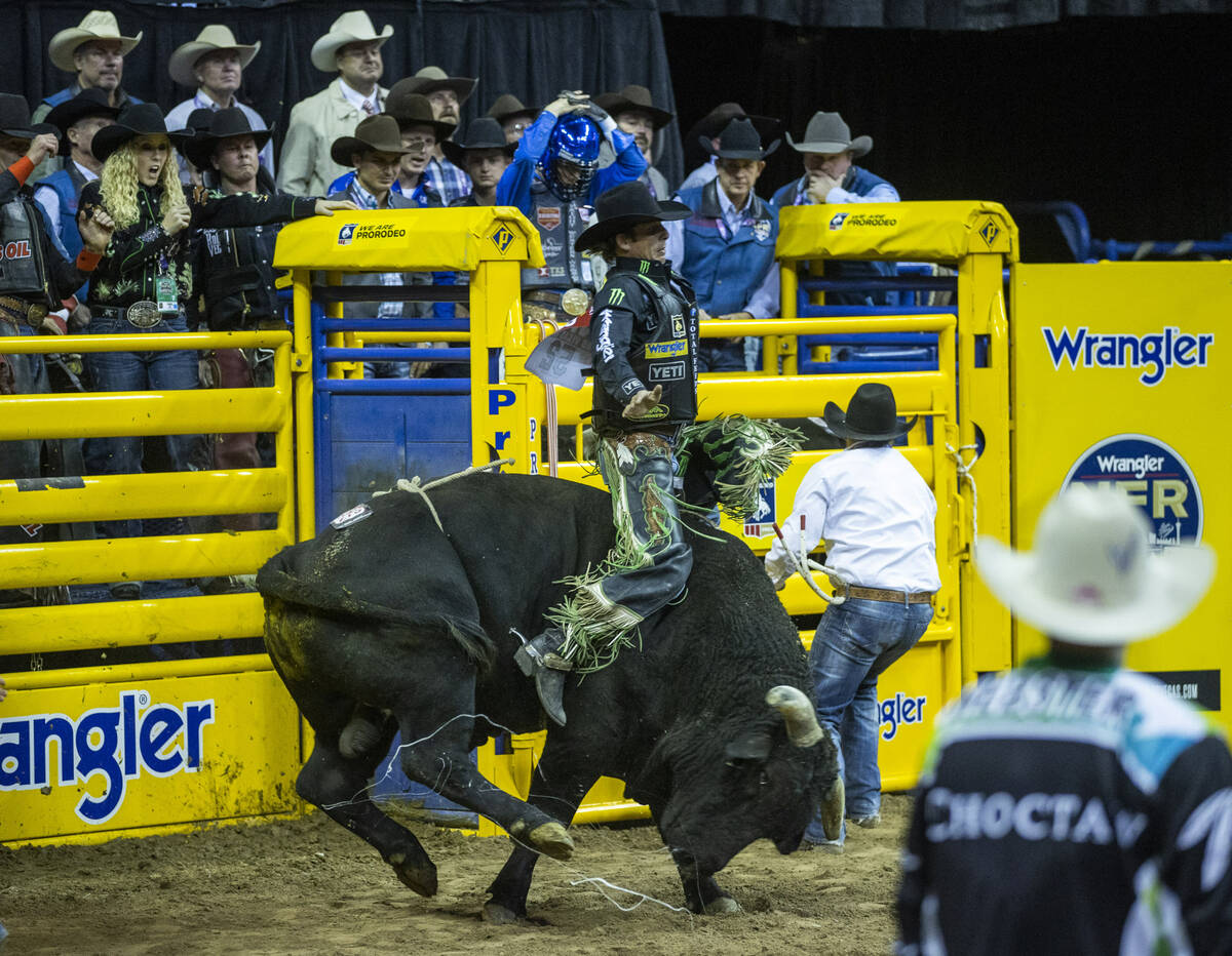 J.B. Mauney of Cotulla, Texas, rides Johnny Thunder in Bull Riding during the Day 2 of the Wran ...