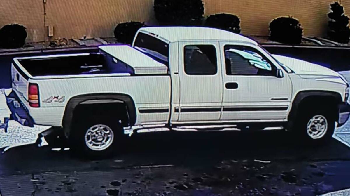 Las Vegas police say the suspect fled from the stores in an older white Chevrolet Silverado pic ...