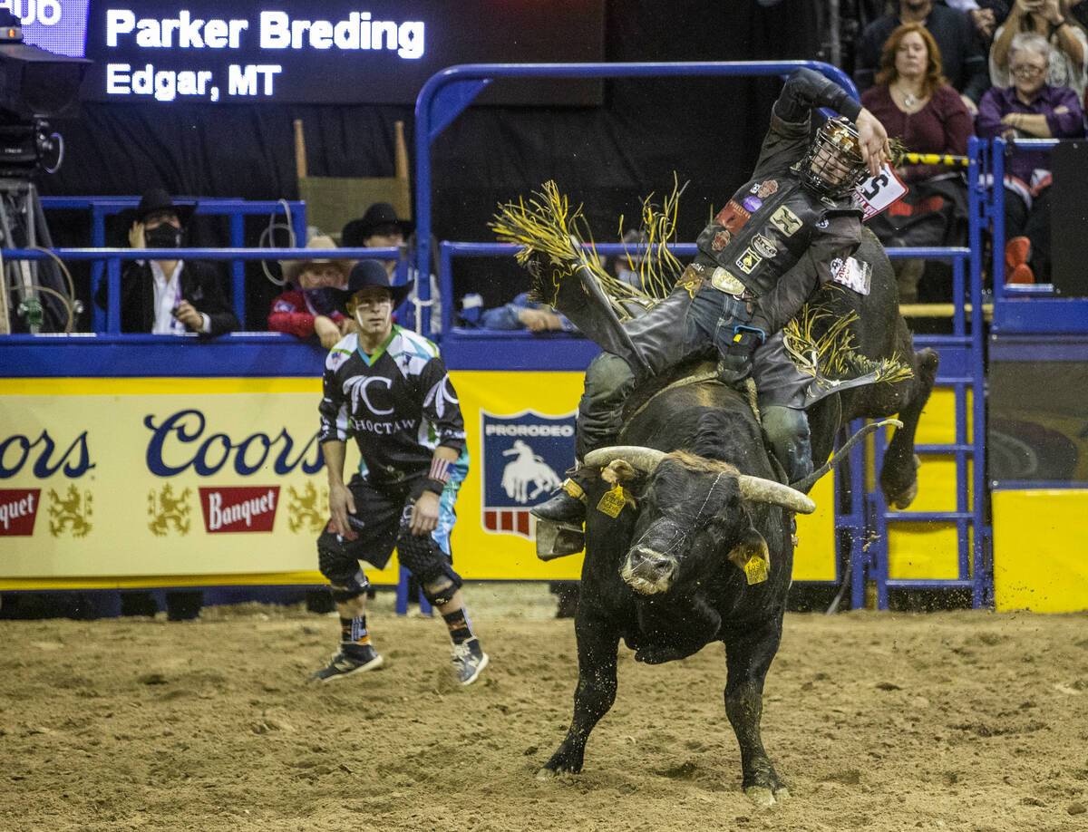Parker Breding of Edgar, MT., rides Lose Your Bones to a first place in Bull Riding during the ...