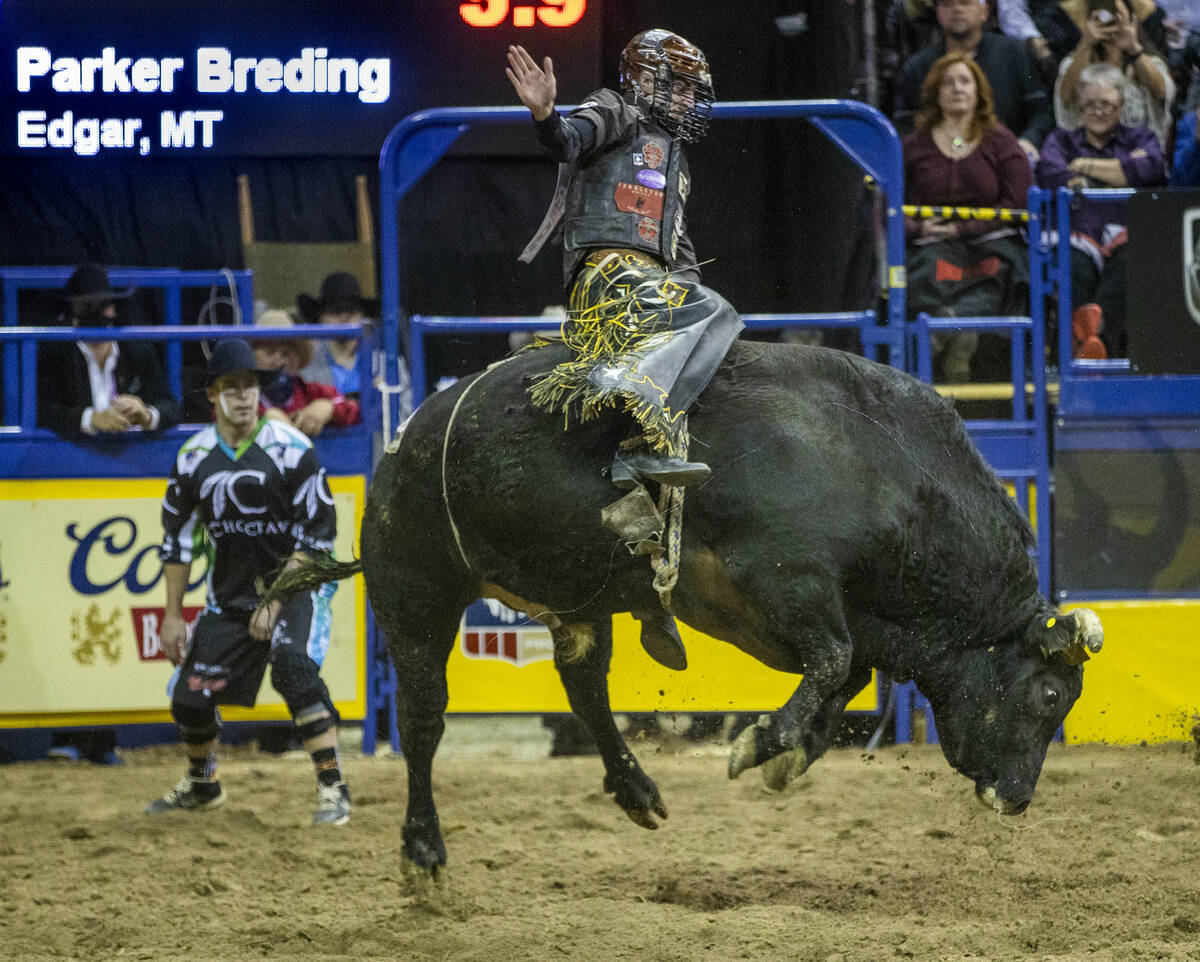 Parker Breding of Edgar, MT., rides Lose Your Bones to a first place in Bull Riding during the ...