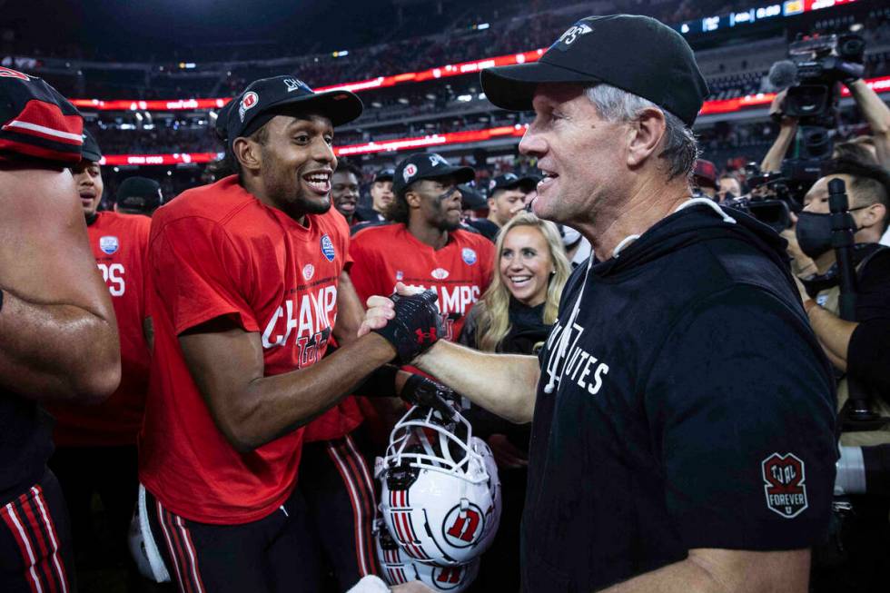 Utah Utes head coach Kyle Whittingham celebrates with his players after beating Oregon Ducks 3 ...