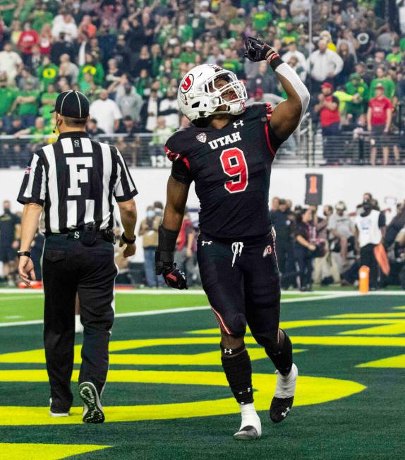 Utah Utes running back Tavion Thomas (9) celebrates his touchdown against Oregon Ducks during t ...