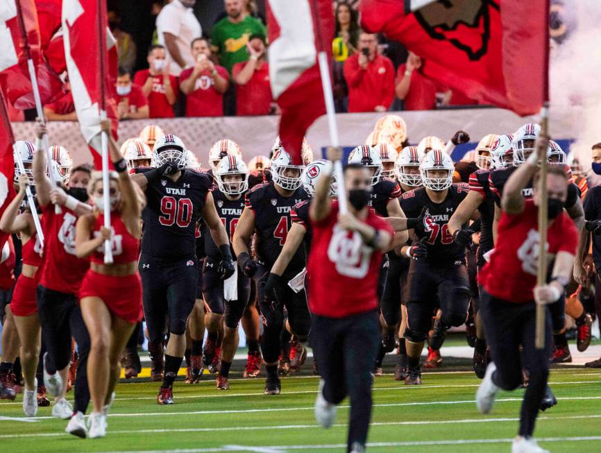 Utah Utes players take the field to face Oregon Ducks during the first half of the Pac-12 champ ...