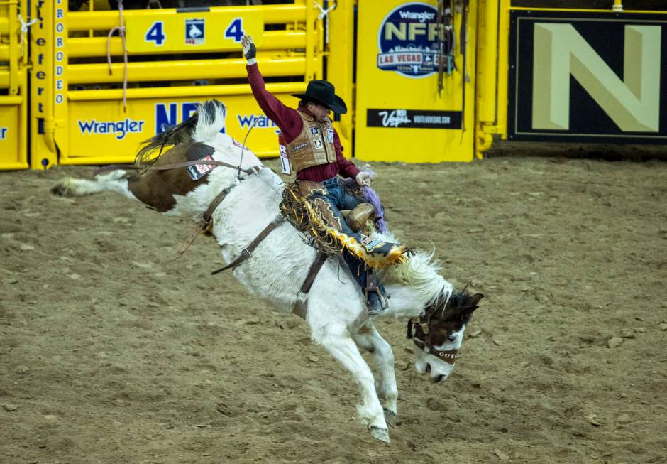 Tegan Smith of Winterset, Iowa, rides Lunatic Party during the opening night of Wrangler Nation ...