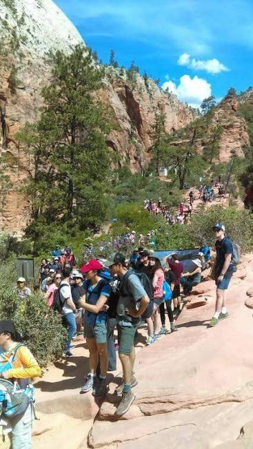In this May 28, 2016 photo, people line up at Angels Landing in Zion National Park, Utah. (Zion ...