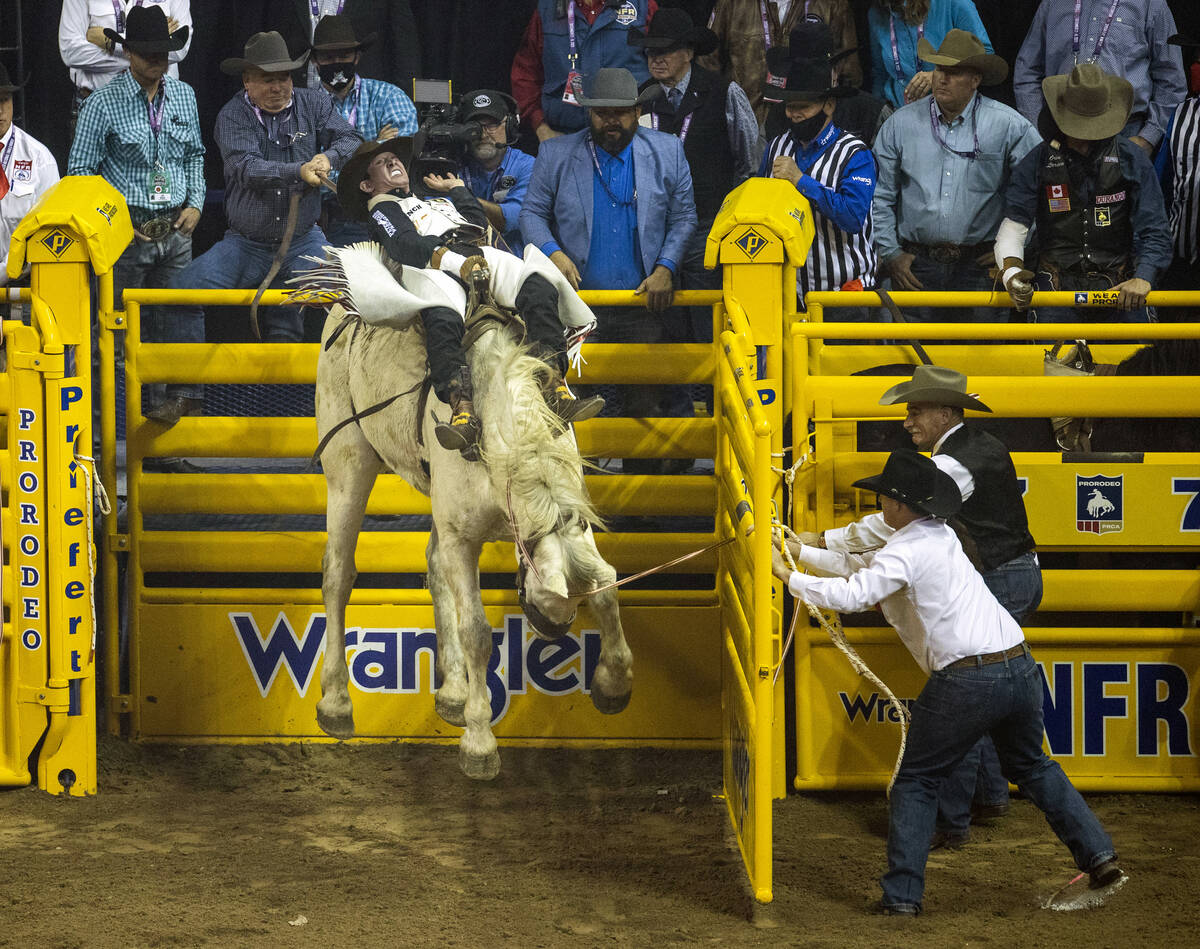 Cole Franks of Clarendon, Texas, rides Deep Springs for first place in Bareback Riding during t ...