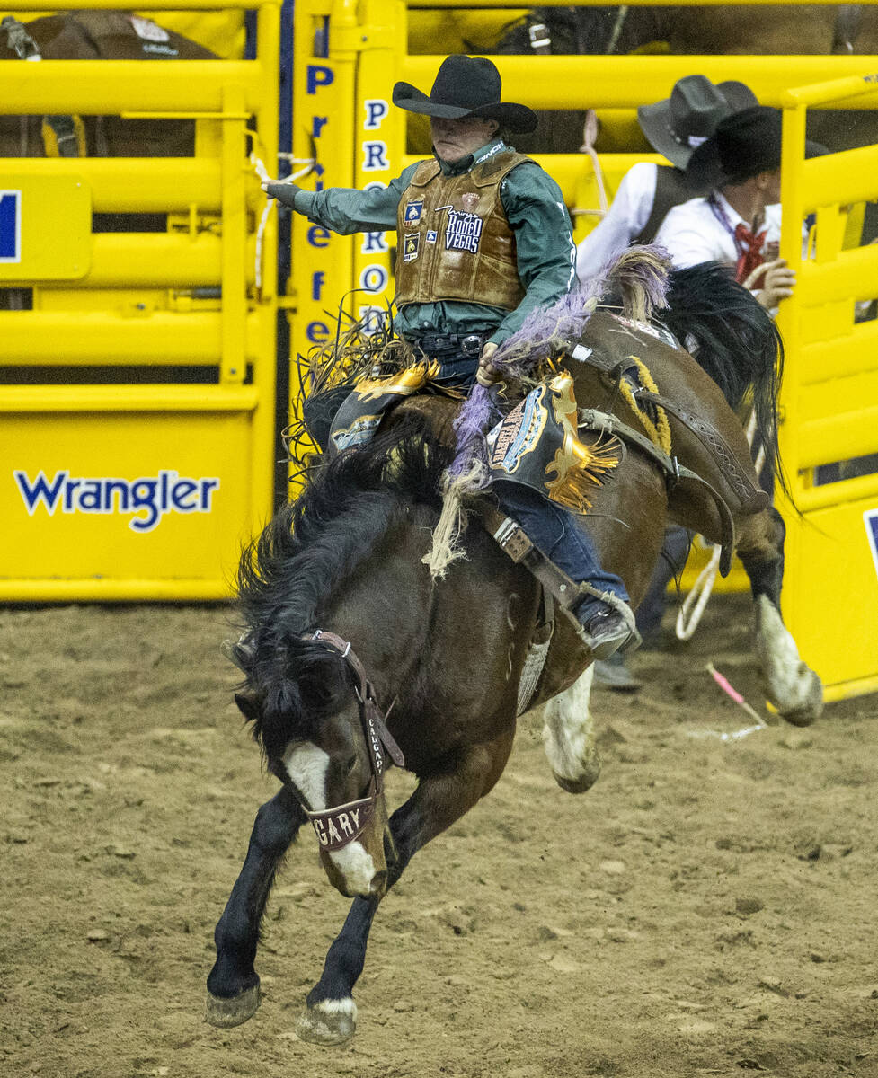 Tegan Smith of Winterset, Iowa, rides Yesterday's Delivery to first place in Saddle Bronc Ridin ...