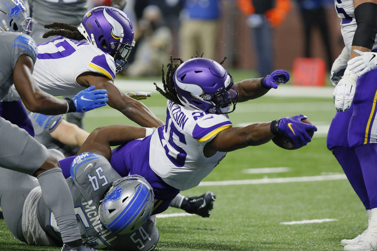 Minnesota Vikings running back Alexander Mattison (25) stretches for the end zone to score duri ...