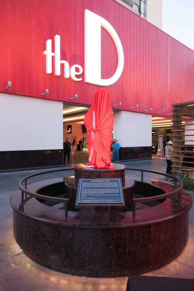 The notorious Manneken Pis statue at the D Las Vegas is shown just before it is revealed after ...