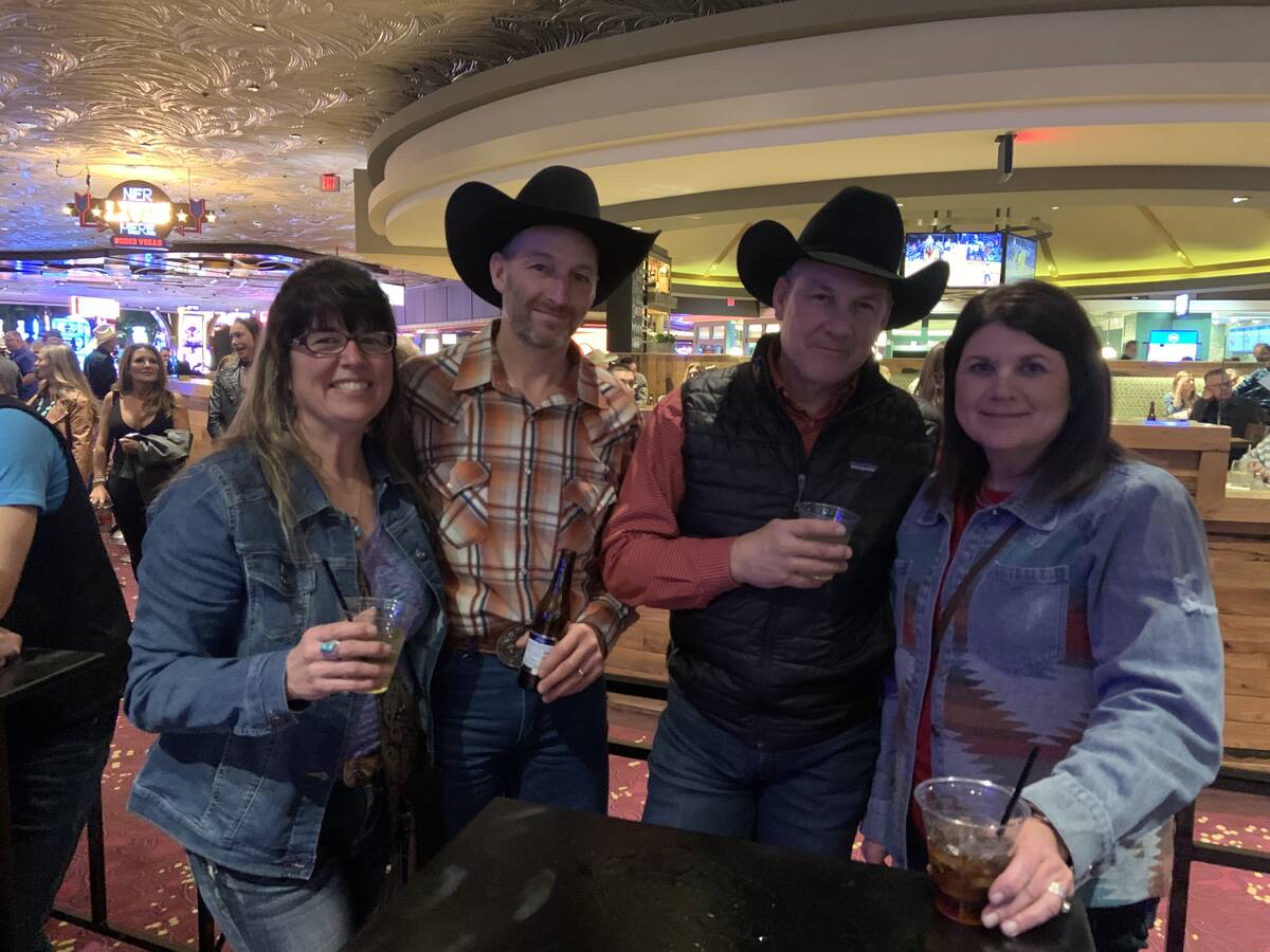 A quartet of rodeo fans from North Dakota found the Wrangler NFR viewing party at The Mirage sp ...