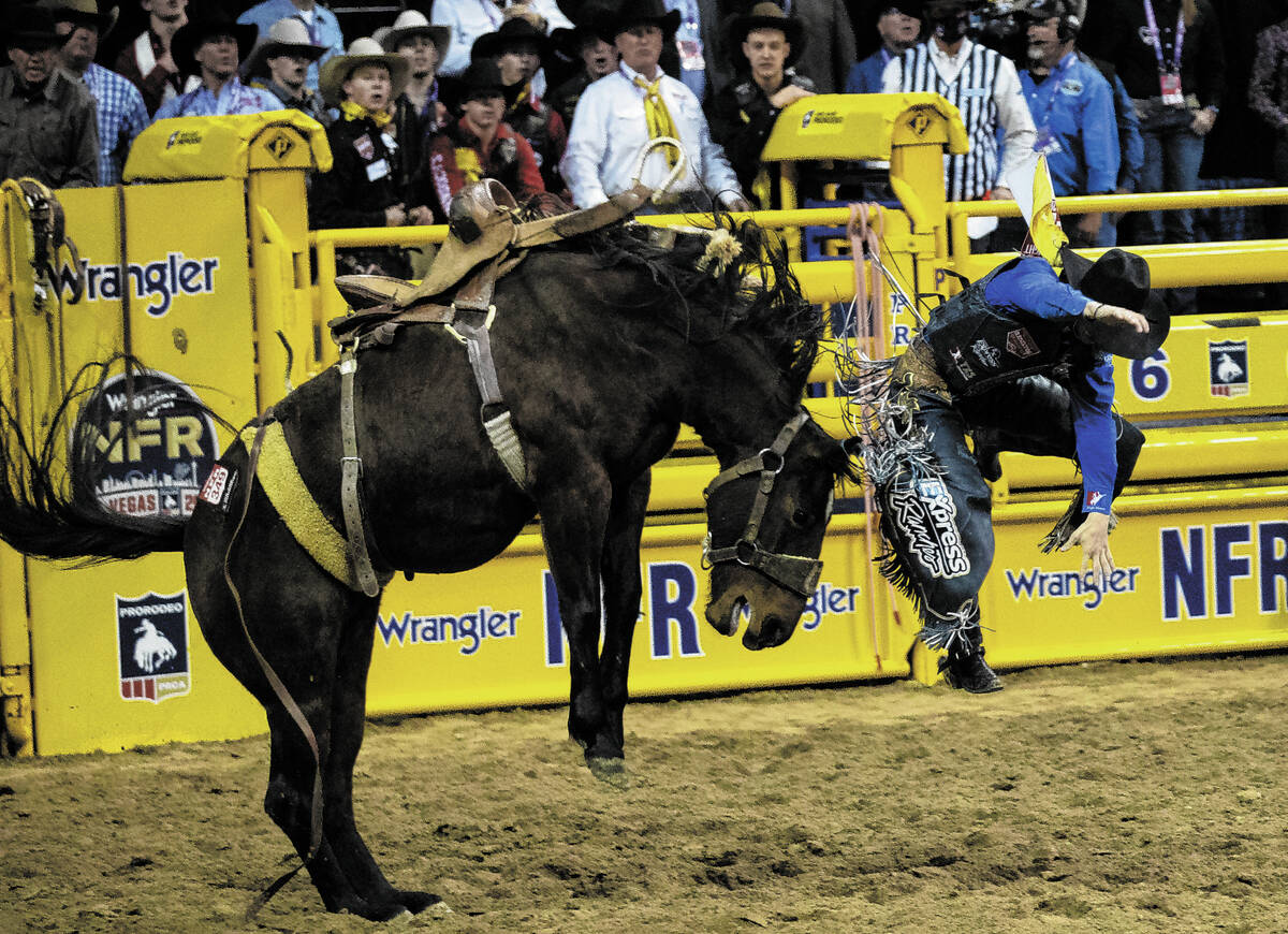 Stetson Wright of Milford, Utah, thrown from Diamond Fever in Saddle Bronc Riding during the fo ...