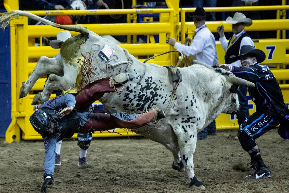 Dustin Boquet of Bourg, La., is thrown during the fourth round of the Wrangler National Finals ...