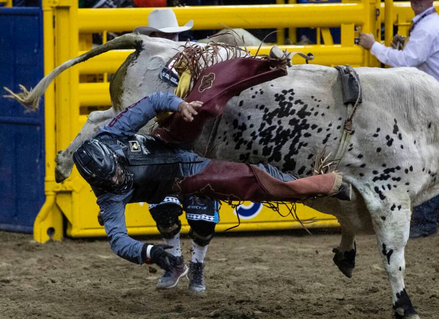 Dustin Boquet of Bourg, La., thrown from rides Hous Bad News in Bull Riding during the fourth r ...