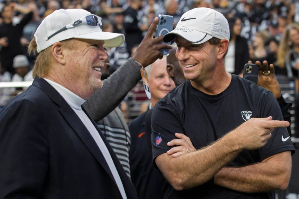 Clemson head football coach Dabo Swinney, right, talks with Raiders owner Mark Davis before the ...