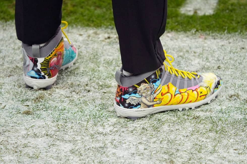Las Vegas Raiders tight end Darren Waller (83) wears My Cause My Cleats shoes before an NFL foo ...