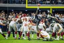 Raiders defensive end Clelin Ferrell (99) just misses the block on Washington Football Team kic ...