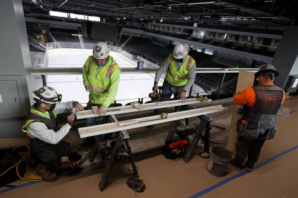 Workers on the Royal Landing premium level at the Dollar Loan Center during a tour of the new S ...